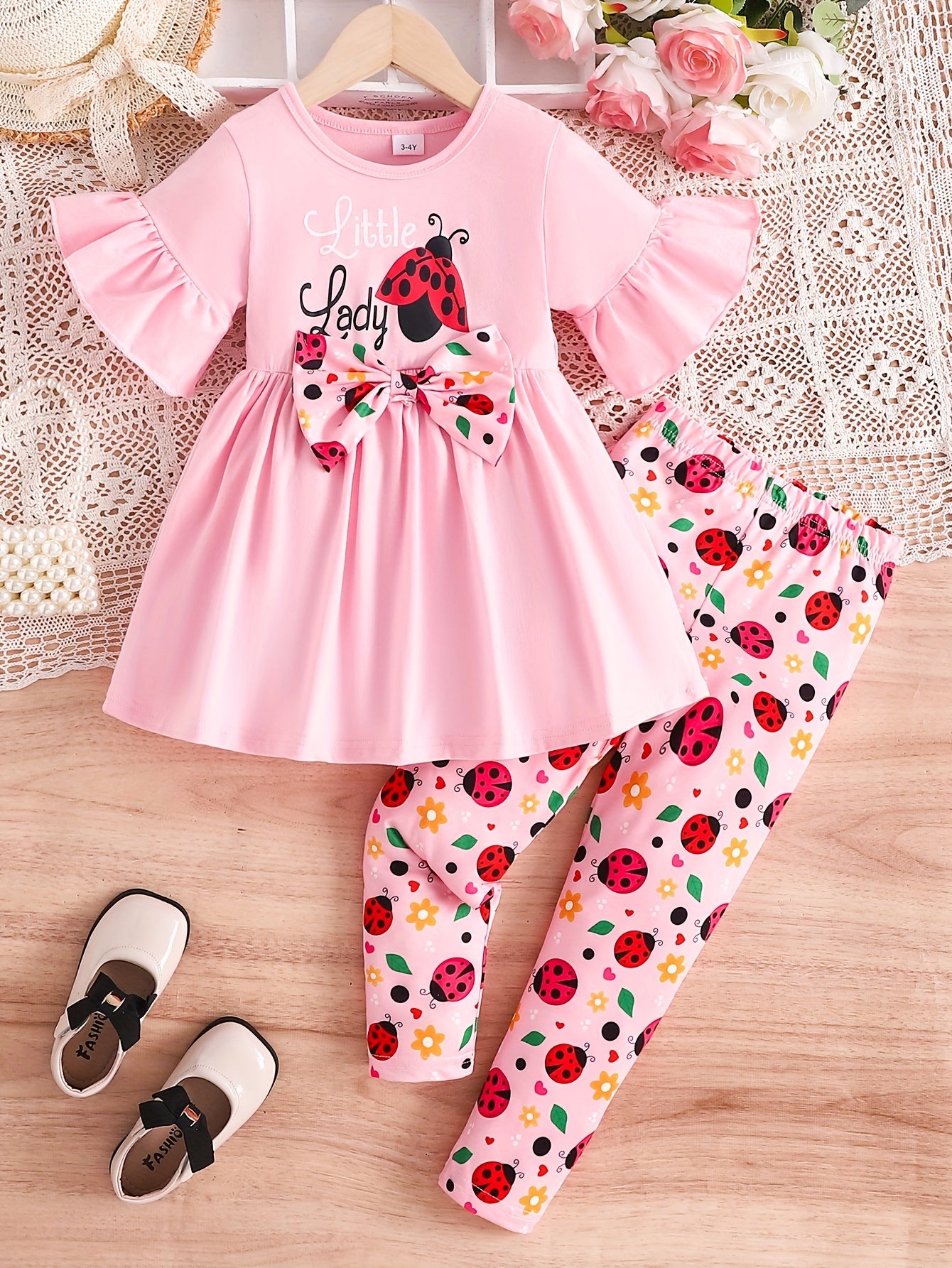 Girls Cartoon Ladybug Outfit - Complete 2-Piece Set with Comfortable Short Sleeves, Adorable Ruffled Hem Detail, Soft and Breathable Cotton Fabric, Vibrant Cartoon Ladybug Pattern, and All-Over Ladybug Print Design