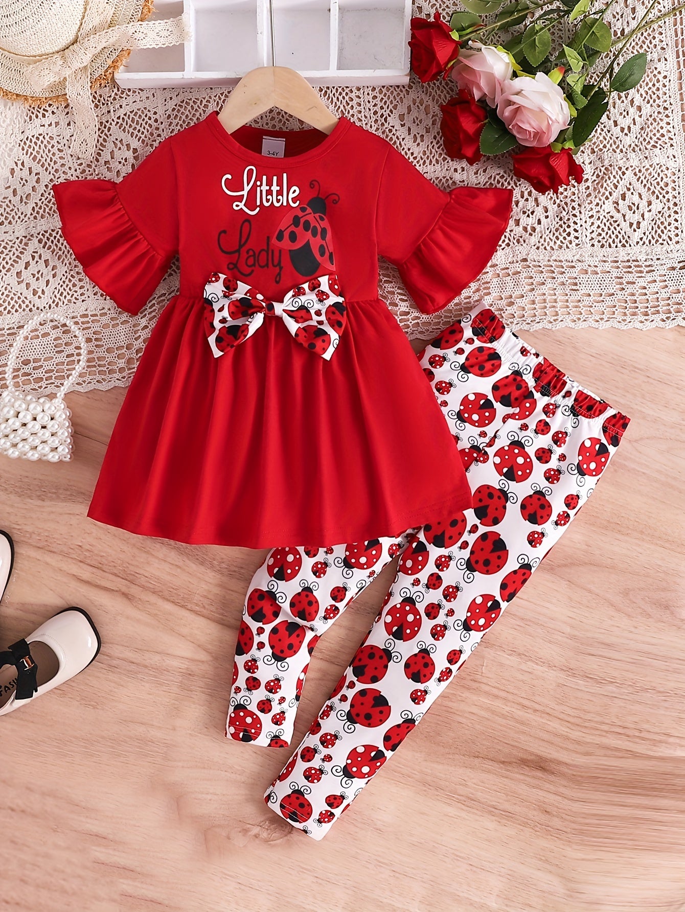 Girls Cartoon Ladybug Outfit - Complete 2-Piece Set with Comfortable Short Sleeves, Adorable Ruffled Hem Detail, Soft and Breathable Cotton Fabric, Vibrant Cartoon Ladybug Pattern, and All-Over Ladybug Print Design