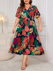 Plus Size Tropical Paradise Dress - Flattering Cinched Waist, Flutter Sleeves, Surplice Neckline - Stylish Midi Vacation Dress for Spring & Summer - Designed for Womens Plus Sizes