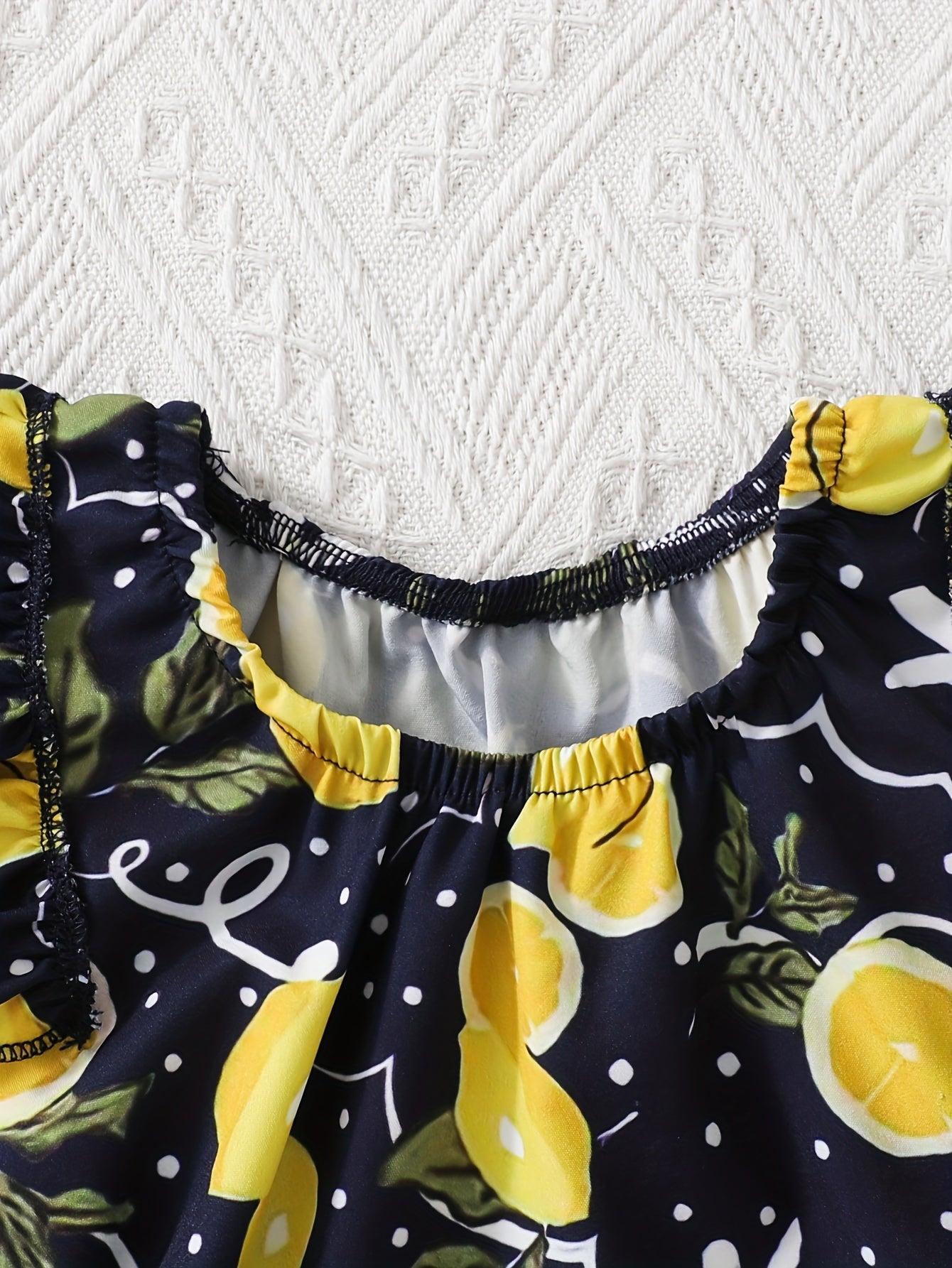 Girls Sleeveless Navy Lemon Print Top with Ruffle Cap Sleeves, Casual Style, Summer Fashion